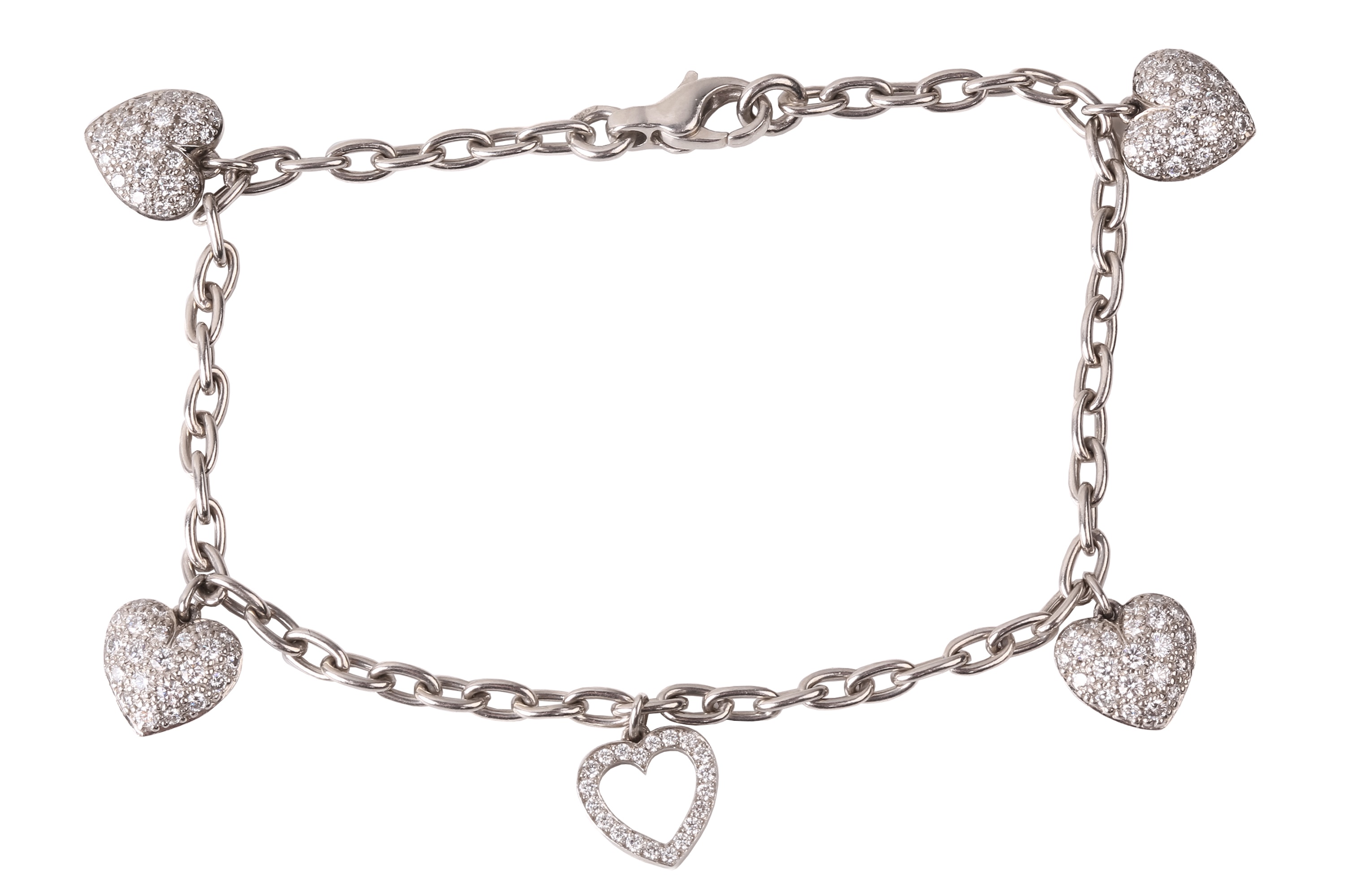 Tiffany & Co. - a diamond-set heart charm bracelet in platinum